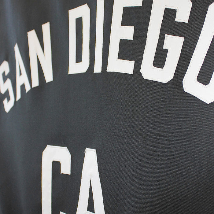 Black fabric with 'San Diego CA' printed in white